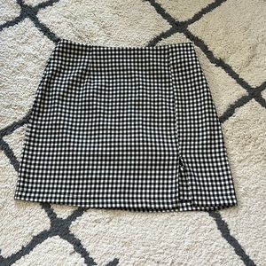 Black and white plaid mini skirt with slit